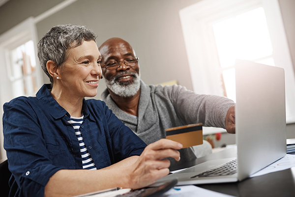 picture of a person using their phone to apply